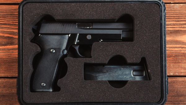 Hand gun in case Hand gun in case