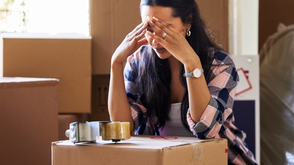 Woman frustrated during a move Woman frustrated during a move