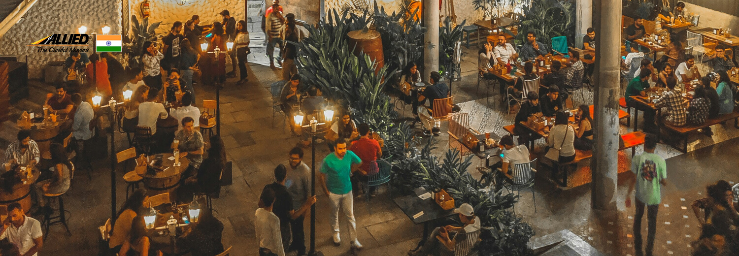 people socialising in a restaurant in India