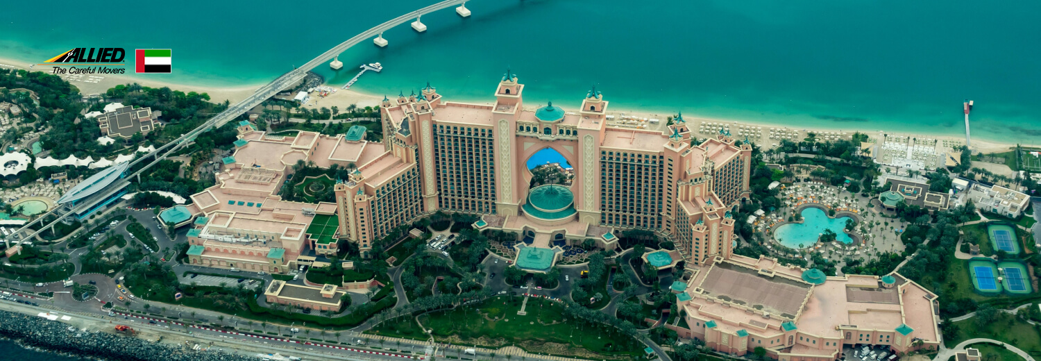 aerial photography of concrete buildings on the middle of the sea