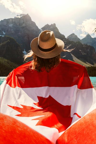 Woman holding Canadian flag