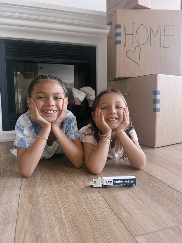 children-smiling-north-american-moving-boxes