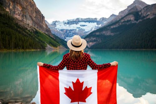 Woman holding Canada Flag